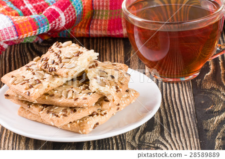 crispy bread with seeds of sunflower, flax and crispy bread with seeds of sunflower, flax and 28589889