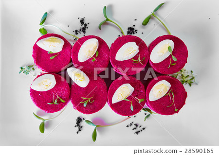 layered salad with herring, beets, carrots, onions 28590165