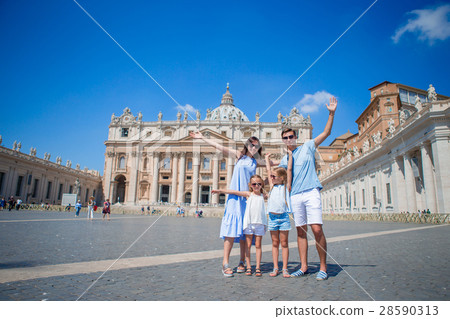 Happy family at St. Peter's Basilica church in 28590313