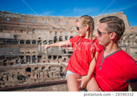 Family tourists in Coliseum, Rome, Italy. Family Family tourists in Coliseum, Rome, Italy. Family 28590332