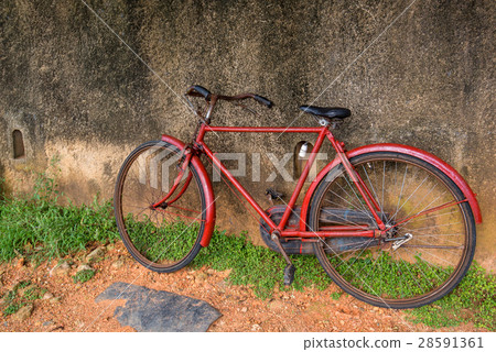 Vintage red bicycle Vintage red bicycle 28591361