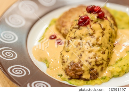 Meat patties or frikadeller in sauce Meat patties or frikadeller in sauce 28591397