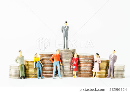 Miniature businessman and people on stack of coins Miniature businessman and people on stack of coins 28596524