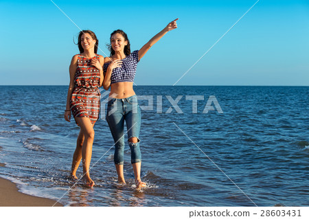 Pretty girl has a fun with her girlfriend on the 28603431