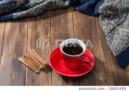 Coffee and blanket on wooden floor Coffee and blanket on wooden floor 28603489