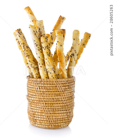 pile of delicious pretzel sticks in basket  28605263