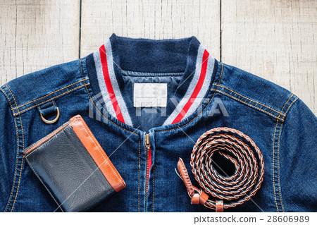 Shirt of blue jeans on wooden. 28606989