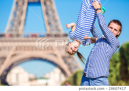 Happy family in Paris background Eiffel Tower on 28607417