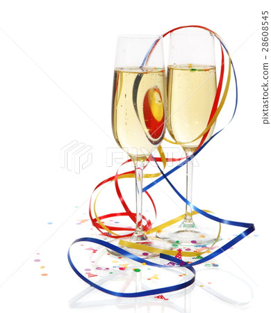 Champagne in two glasses with streamers Champagne in two glasses with streamers 28608545