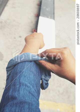 Woman roll up the sleeves Woman roll up the sleeves 28608697