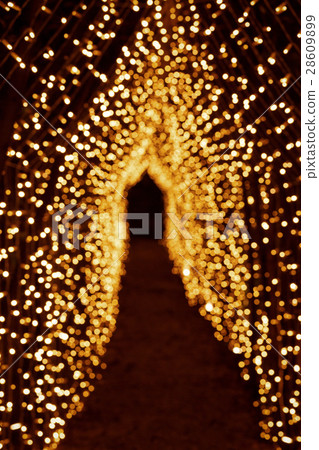 Look at long path leading under the arch of yellow Look at long path leading under the arch of yellow 28609899