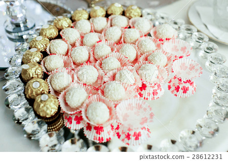 Look from above at Raffaello and Ferrero sweets Look from above at Raffaello and Ferrero sweets 28612231