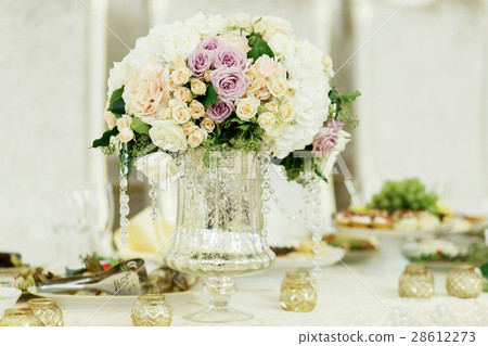 Bouquet of tender violet and beige roses stands Bouquet of tender violet and beige roses stands 28612273
