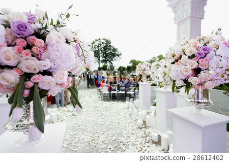 Look from behind large bouquet of roses Look from behind large bouquet of roses 28612402