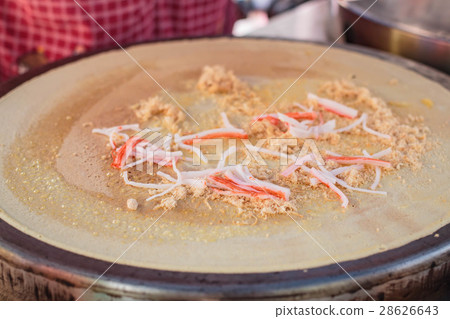 Freshly made Crepe on a hot plate. 28626643