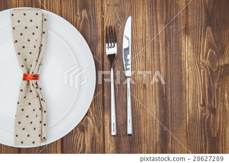 dinner setting, Knife, fork, napkin dinner plate dinner setting, Knife, fork, napkin dinner plate 28627289