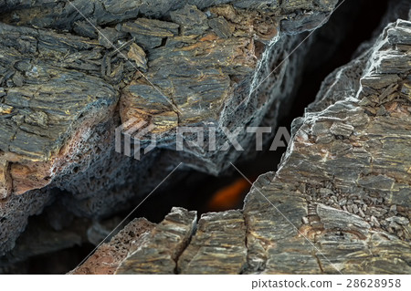 Fire at the crack of frozen lava field at 28628958
