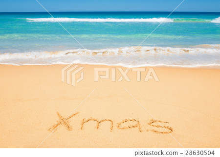 Xmas message on the beach sand Xmas message on the beach sand 28630504