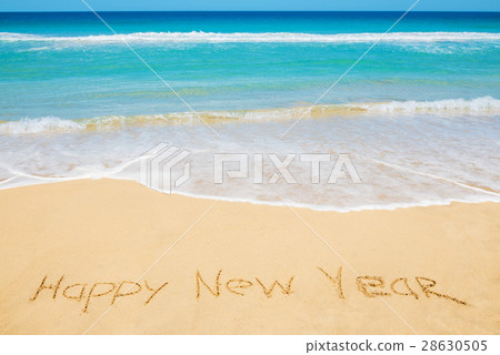 Happy New Year message on the beach Happy New Year message on the beach 28630505