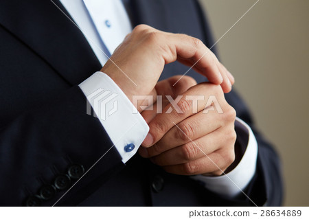 Man in black suit 28634889