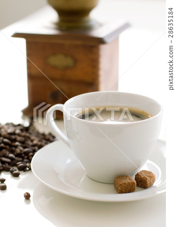 Cup of coffee with sugar and grinder Cup of coffee with sugar and grinder 28635184