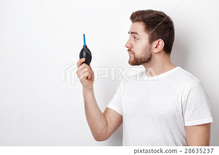 photographer holding camera cleaning vacuum pump photographer holding camera cleaning vacuum pump 28635237