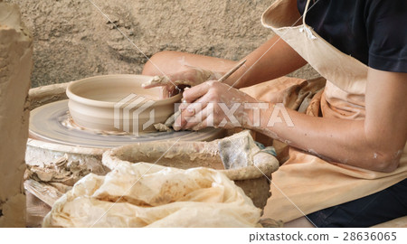 Young woman hands working on pottery wheel 28636065