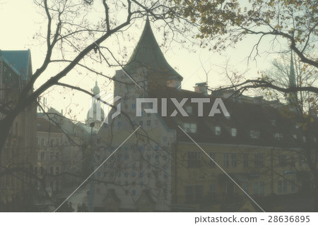 View of the old city through the autumnal park 28636895