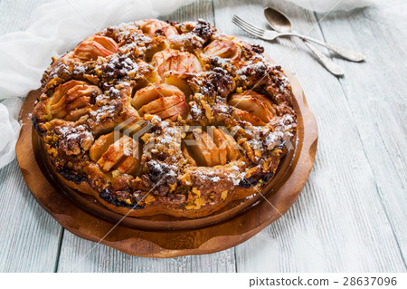 Homemade sweet fruit cake on wooden board 28637096