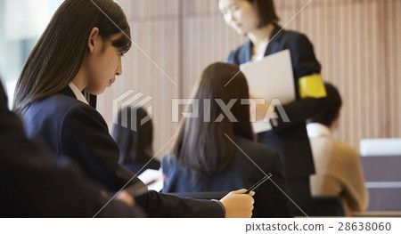 Students taking the examination venue exam 28638060