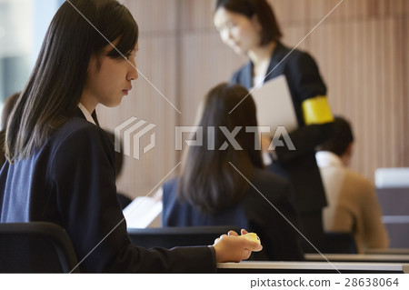 Students taking the examination venue exam 28638064