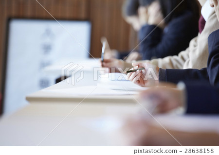 Students taking the examination venue exam 28638158