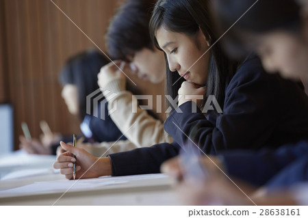 Students taking the examination venue exam 28638161