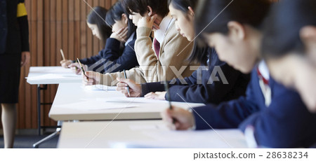 Students taking the examination venue exam 28638234