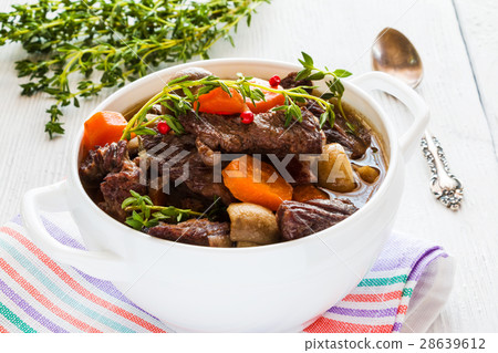 Beef Bourguignon in a white soup bowl 28639612