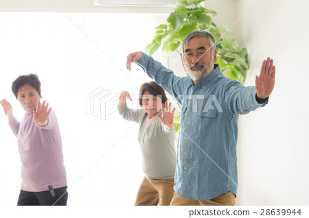 Energetic Japanese senior men and women playing Tai Chi Energetic Japanese senior men and women playing Tai Chi 28639944