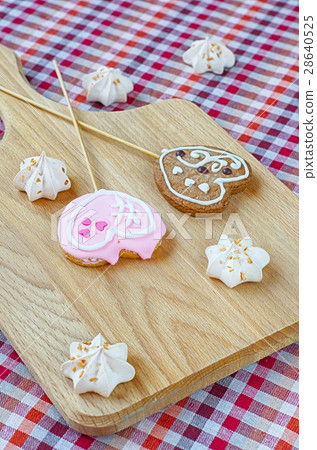 Sweet white meringue and oatmeal cookies in the form of hearts 28640525