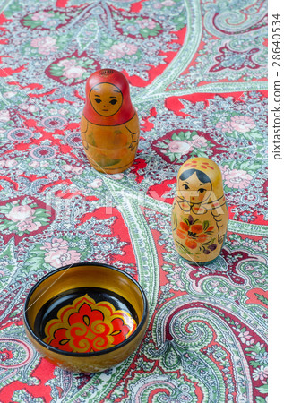 Russian nesting dolls on the traditional handkerchief. Russian nesting dolls on the traditional handkerchief. 28640534