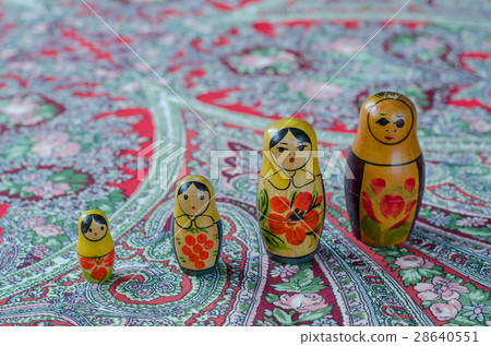 Russian nesting dolls on the traditional handkerchief. Russian nesting dolls on the traditional handkerchief. 28640551