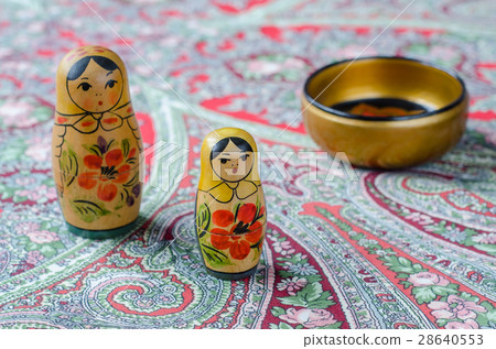 Russian nesting dolls on the traditional handkerchief. Russian nesting dolls on the traditional handkerchief. 28640553