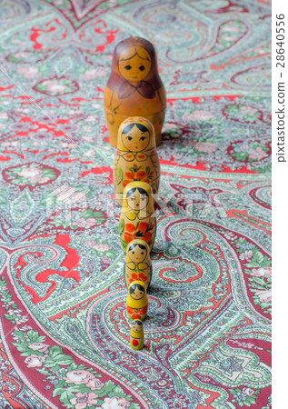Russian nesting dolls on the traditional handkerchief. Russian nesting dolls on the traditional handkerchief. 28640556