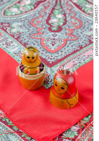 Russian nesting dolls on the traditional handkerchief. Russian nesting dolls on the traditional handkerchief. 28640557