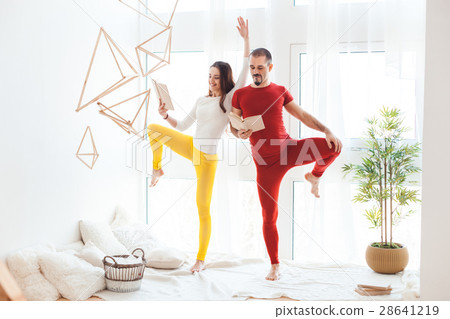 Young people engaged in gymnastics. Young people engaged in gymnastics. 28641219