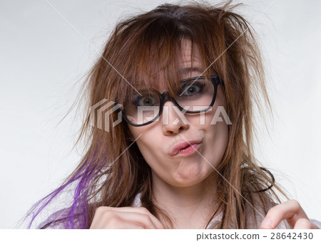 Grimacing scientist shaggy woman Grimacing scientist shaggy woman 28642430