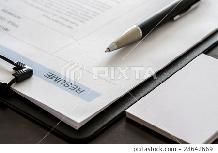 Close-up resume, pen and business card Close-up resume, pen and business card 28642669