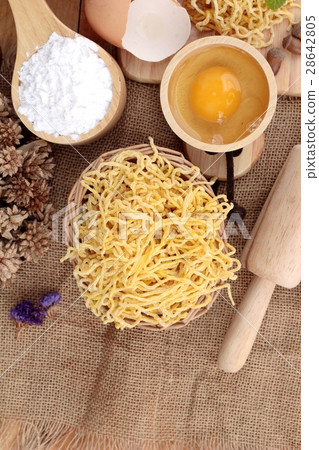 图库照片 making noodle with wheat flour and egg for cooking