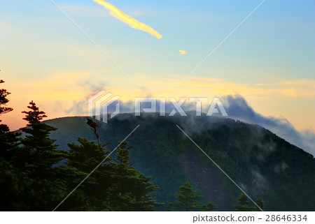 Cloud-sprawling ridgeline seen from the Yatsugatake mountains / Mt. Cloud-sprawling ridgeline seen from the Yatsugatake mountains / Mt. 28646334