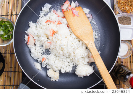 Chef cooking rice in pan Chef cooking rice in pan 28646834
