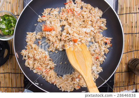 Chef cooking rice in pan Chef cooking rice in pan 28646838