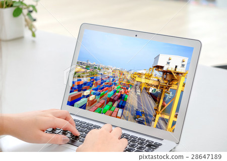 Hands woman working online of logistics on laptop Hands woman working online of logistics on laptop 28647189